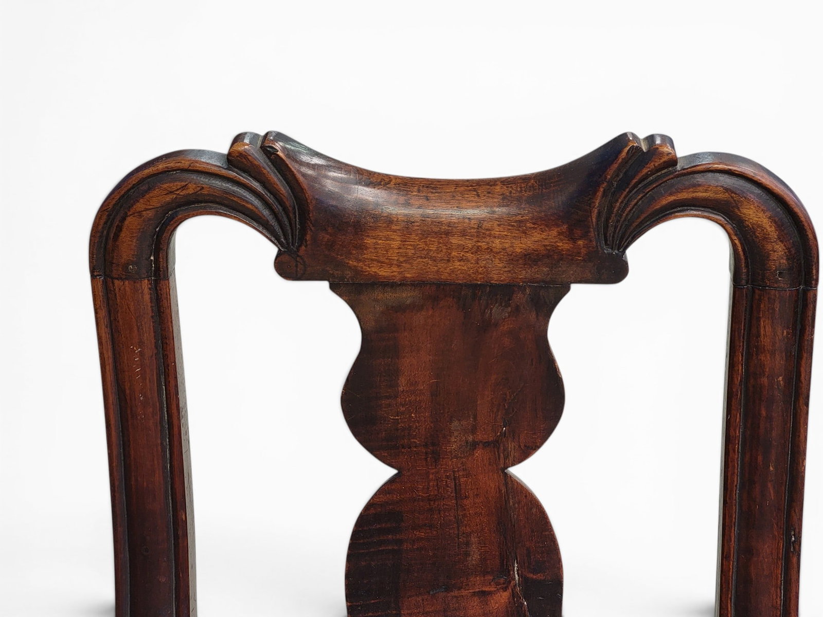 THREE EARLY AMERICAN CHAIRS: 18th-19th century, maple. Includes a New England banister back, a New England vasiform splat chair with Spanish feet, and a classical curly maple armchair. 33.5" to 42.5" high. Provenance: from the