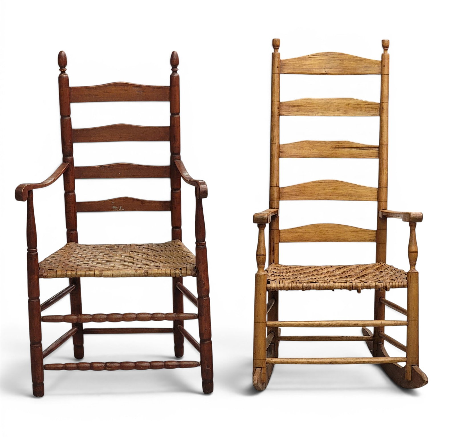 FOUR EARLY AMERICAN CHAIRS: 18th-19th century, most are maple. All ladder backs, one a rocking chair, two have rush seats and two have splint seats. 42" to 45" high. Provenance: from the collection of Diane Whyte Miller