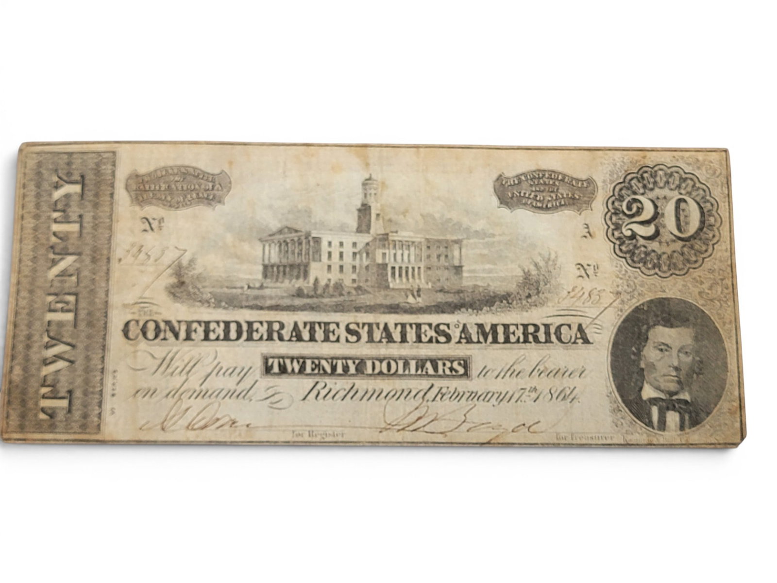 COLLECTION OF CIVIL WAR RELICS: Includes a $20 Confederate note; together with a collection of rocks and munitions, the latter all with notes indicating they were mostly collected at Gettysburg, with one 3" ball found on
