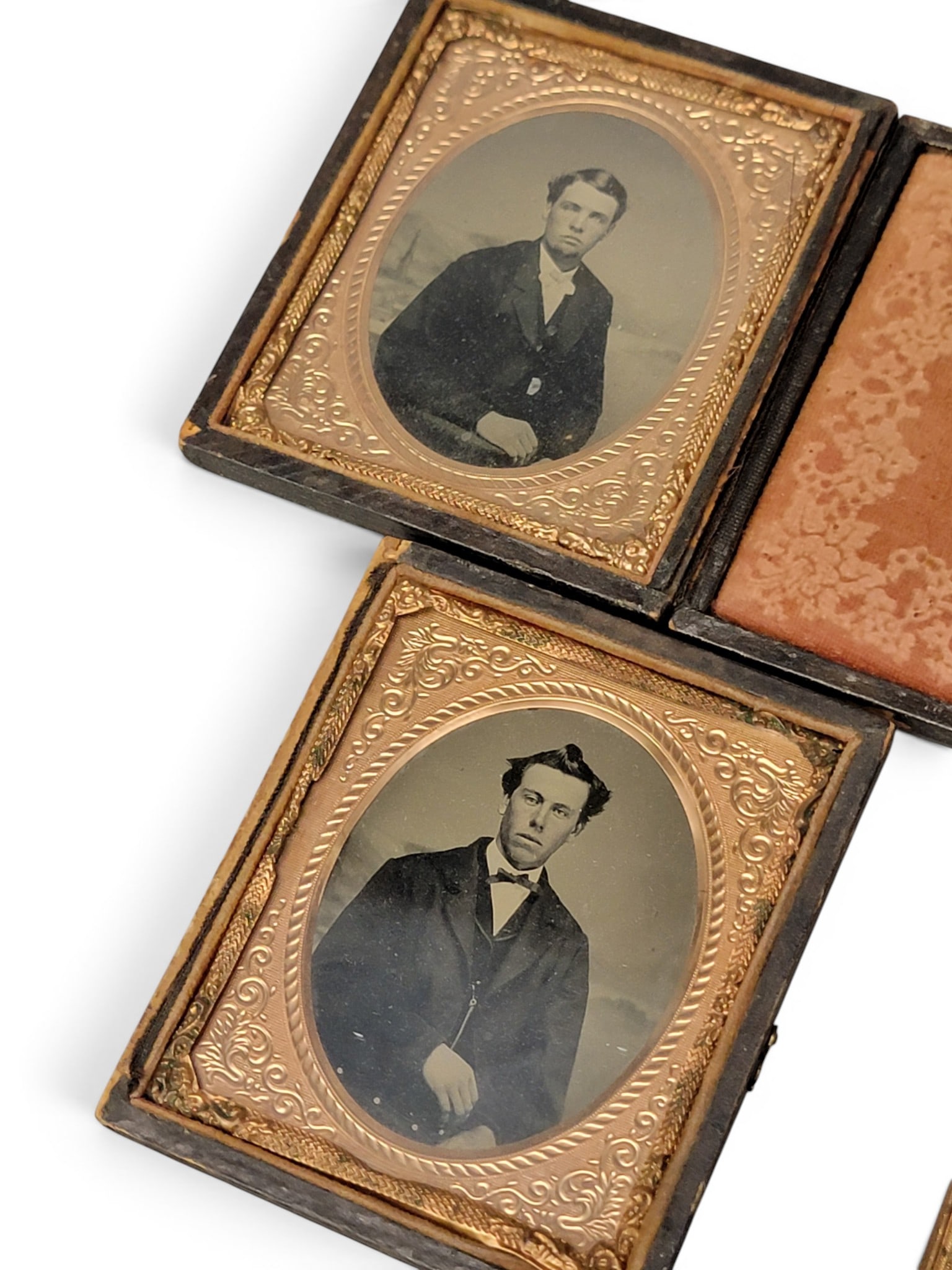 COLLECTION OF EARLY PHOTOGRAPHS: American, mid-19th century. Includes a quarter plate ambrotype of a couple, four sixth plate tintypes of gentlemen, and a ninth plate tintype of a gentleman. Provenance: a West Virginia collection.
