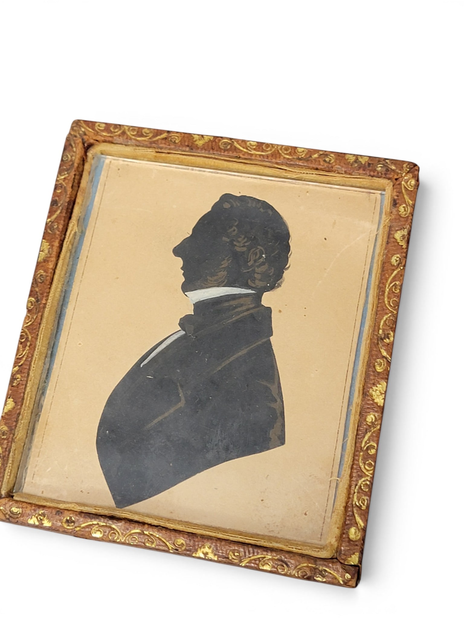 FOUR SILHOUETTES: 19th century. Includes a profile of a man by Peter Skeolan (act. England, 1830s-1840s), a full length profile of a dapper gentleman, a bust profile of an older woman, and a profile of a young lady