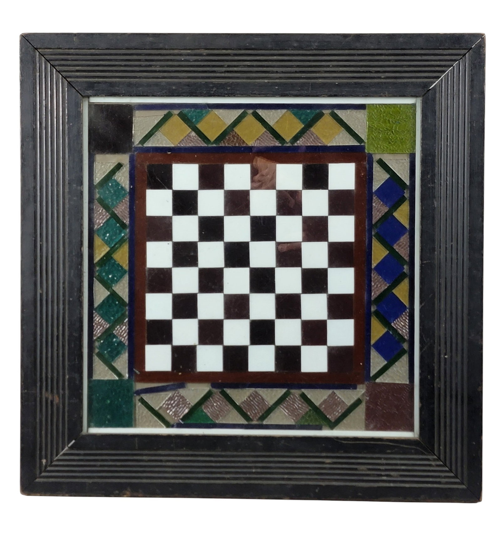 UNUSUAL STAINED GLASS GAMEBOARD: American, early 20th century. Checkers/chess board with colorful border. In a period frame, 21" square (overall). Provenance: a northeast Ohio collection. NOTE: We are happy to answer questions and