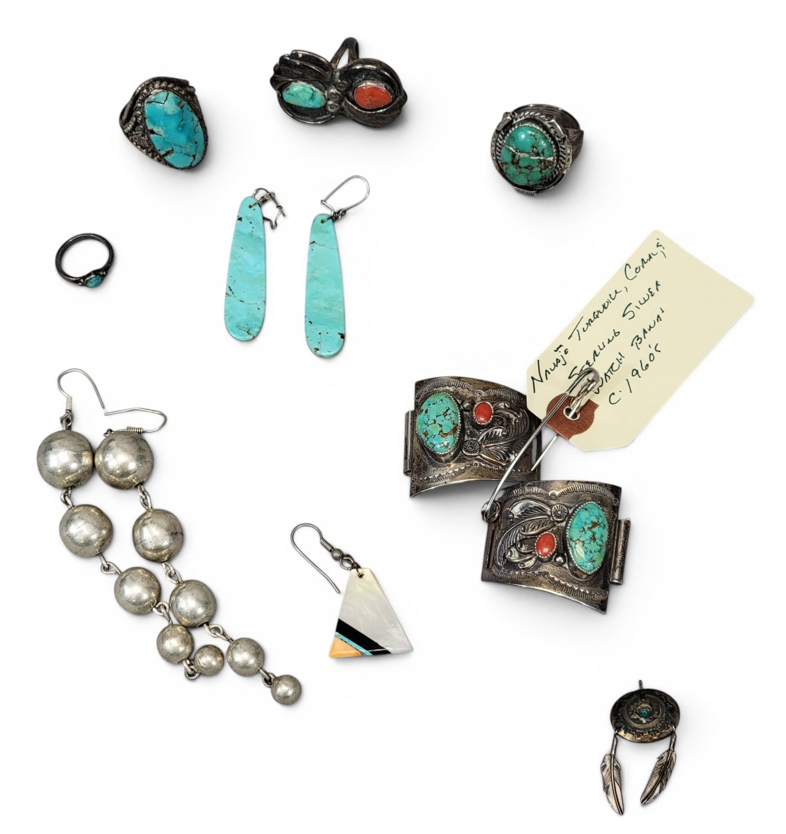 COLLECTION OF SOUTHWESTERN JEWELRY: Unmarked (probably) sterling and tuquoise. Includes a Frederick Henry Harvey, Navajo watch band, a pair of graduated ball earrings, a pair of polished turquoise earrings, and two unmatched earrings;