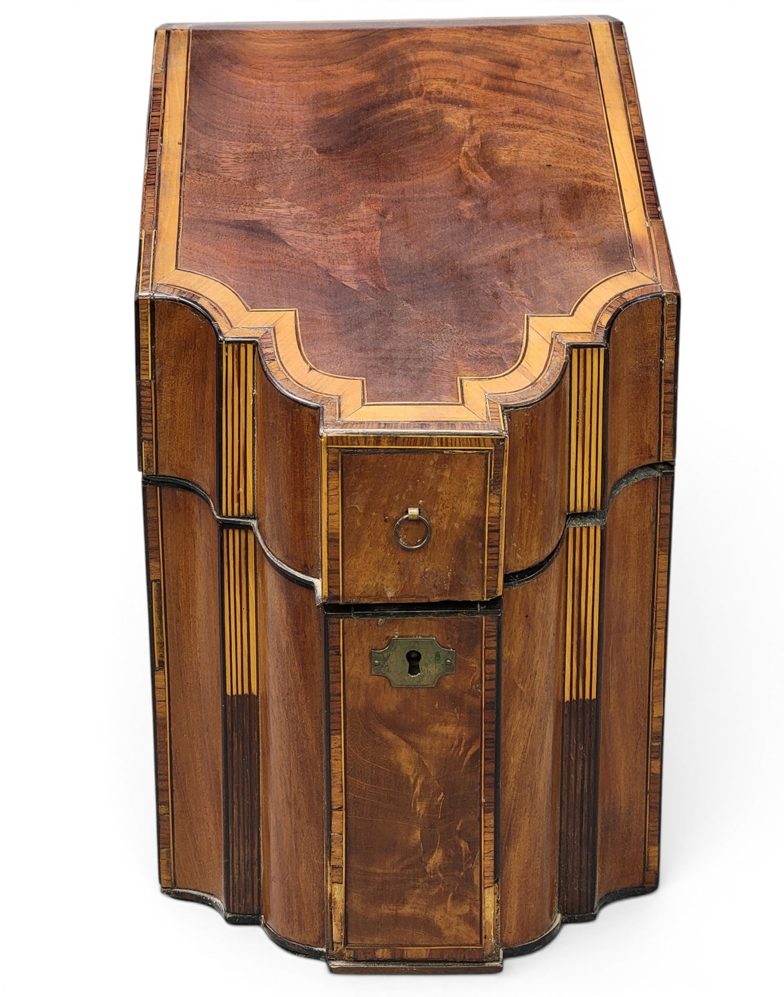INLAID KNIFE BOX: Probably English, early 19th century, mahogany. Serpentine and blocked front, with crossbanded and other inlaid decoration. 14.75" high, 9" wide, 12" deep. Provenance: a southeast Ohio family. NOTE: