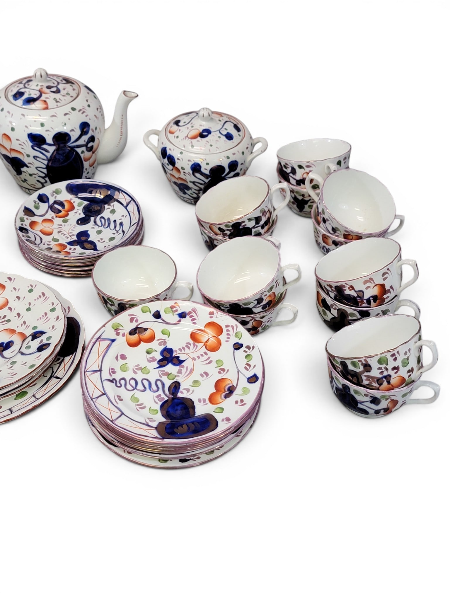 SET OF GAUDY WELSH OYSTER PATTERN CHINA: English, 19th century. Includes various sizes of plates, as well as cups and saucers, and serving pieces. Provenance: Collection of Bob and Maxine Edwards, New Philadelphia, Ohio. NOTE: We are happy