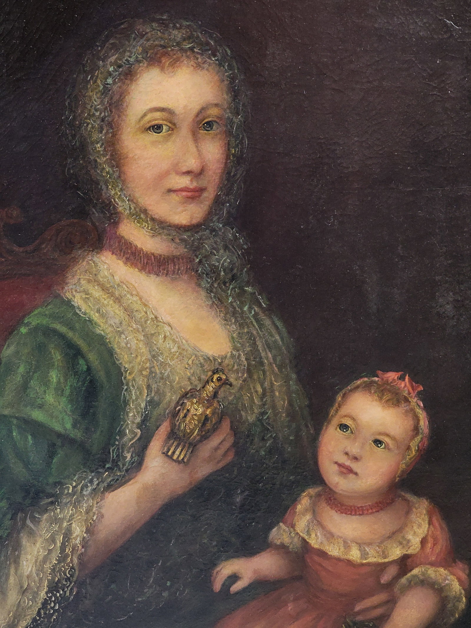 PORTRAIT OF A MOTHER AND CHILD: European, 18th century, oil on canvas. Large, seated portrait of a wealthy mother and her charming child; both are well dressed, the mother holds a bird and the child wears a coral necklace.