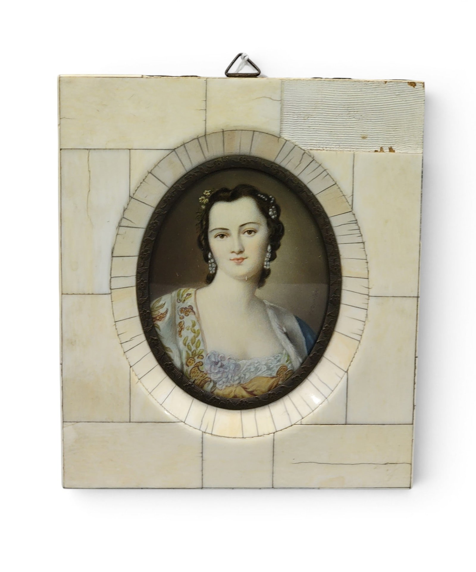 MINIATURE PORTRAIT OF A LOVELY LADY: European, late 19th century, after Rosalba Carriera (Italian, 1673-1757), signature lower right. Bust-length portrait of a lovely and well-dressed lady, with flowers and pearls in her hair. In its
