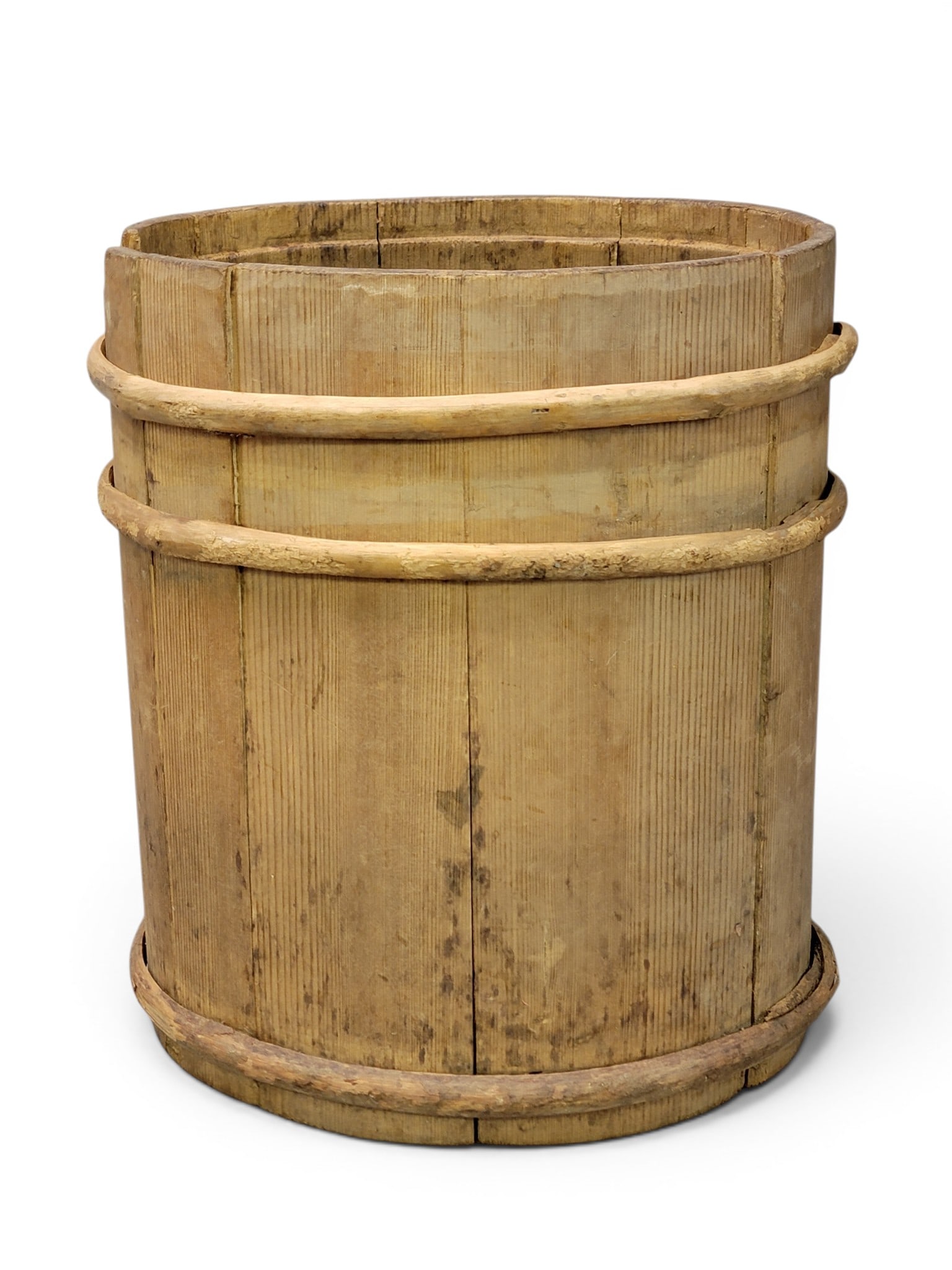 TWO CHURNS: European, early 20th century. Stave constructed with wrapped bands. 16" and 14" high. Provenance: a Kentucky collection. NOTE: We are happy to answer questions and take additional photos of lots prior
