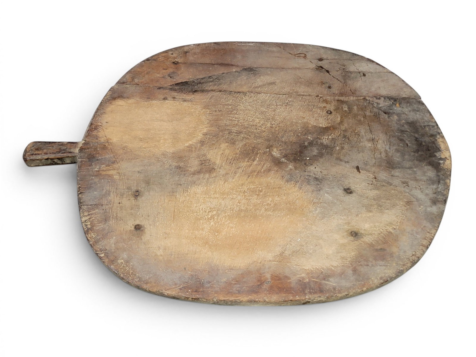 THREE CUTTING BOARDS: European, 19th-20th century. Various shapes and sizes. 30" to 34" diameter. Provenance: a Kentucky collection. NOTE: We are happy to answer questions and take additional photos of lots prior to the
