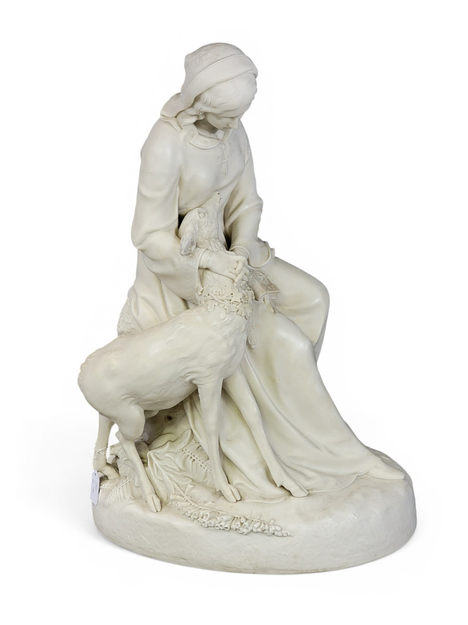 "EMILY AND THE WHITE DOE" PARIAN SCULPTURE: Copeland, after the original by Felix Martin Miller, early 20th century. Stamped "Norton of Rylstone", "COPELAND", "COPYRIGHT RESERVED", and "F.M. MILLER. SCH." to back of base. 19.5" high. Provenance