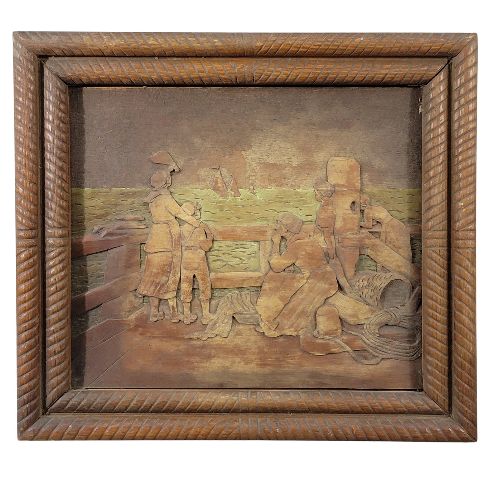 EUROPEAN PLAQUE AND PRINT: Early 20th century. Includes a Dutch relief-carved plaque depicting a harbor scene, 16.75" high, 19" wide (overall); together with a textured print of a boy after an original painting, 12" high,