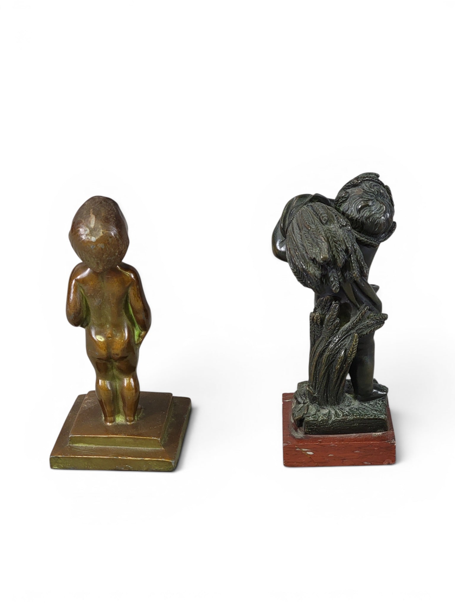 TWO BRONZE SCULPTURES OF CHILDREN: Includes Louis Hibbard Wilder (b. 1898), standing child, 1929, 7.5" high; together with a child holding wheat after Michel Claude Clodion (1738-1814), 8" high. Provenance: a northeast Ohio