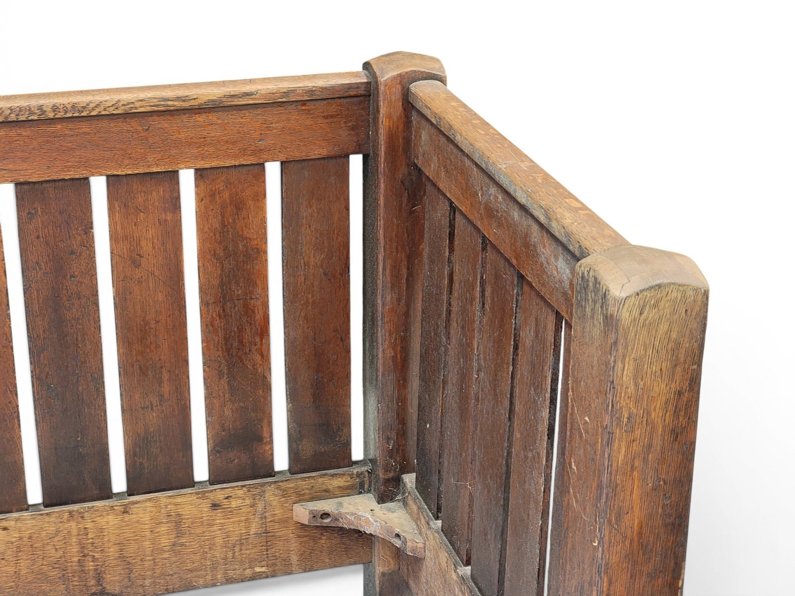STICKLEY ARTS & CRAFTS SETTEE: Marked for L. & J. G. Stickley, Fayetteville, New York, early 20th century, oak. Level arms and back, and with a chamfered front seat rail. 33.75" high, 76" long. Provenance: a Pennsylvania