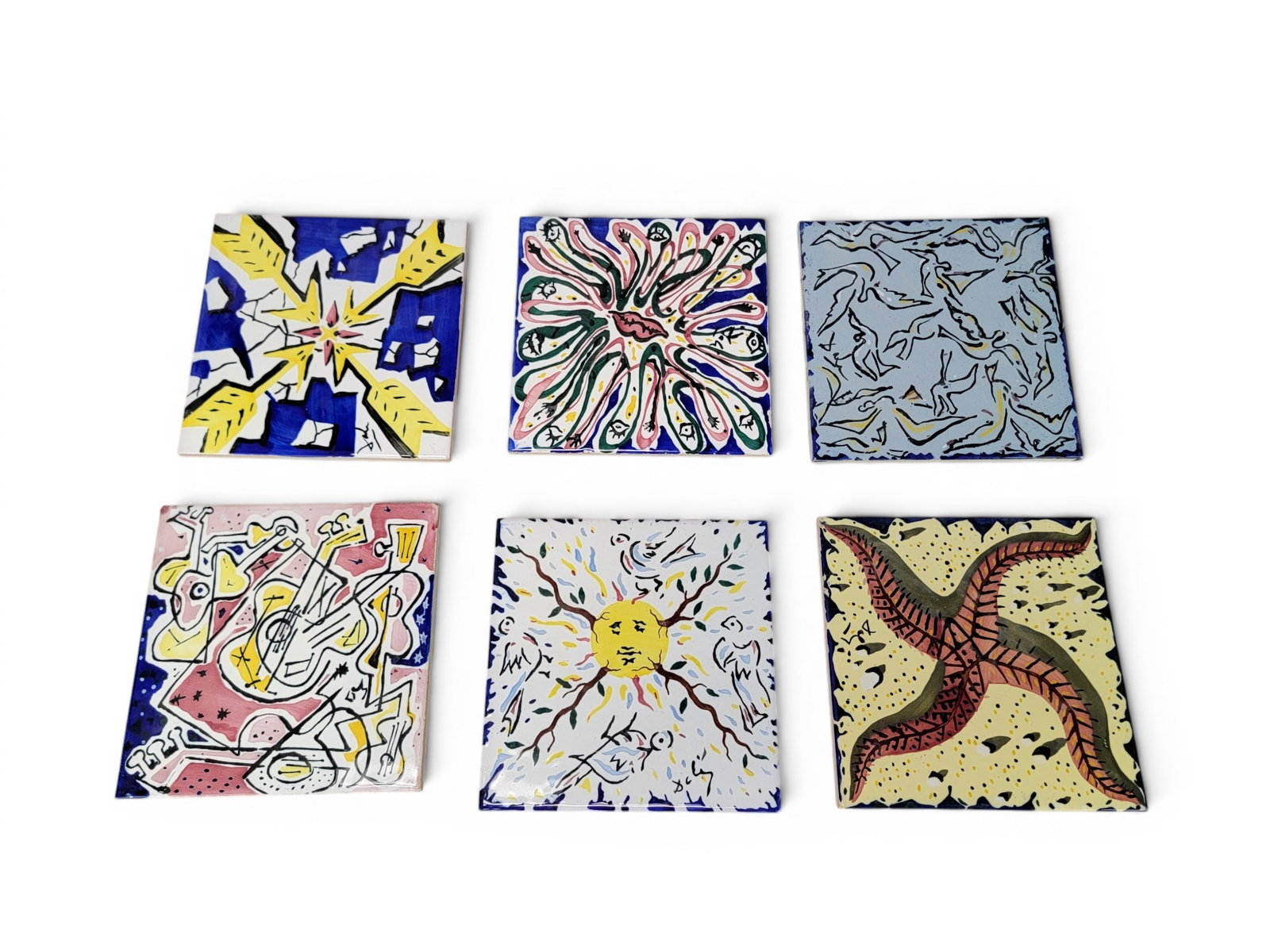 DALI'S LA SUITE CATALANE (6 TILES): Salvador Dali (Spanish, 1904-1989). Set of six glazed ceramic tiles, marked on the back, dated 1954, made in Spain. In their original crate. 7.875" square. Provenance: a Kentucky collection. NOTE: We