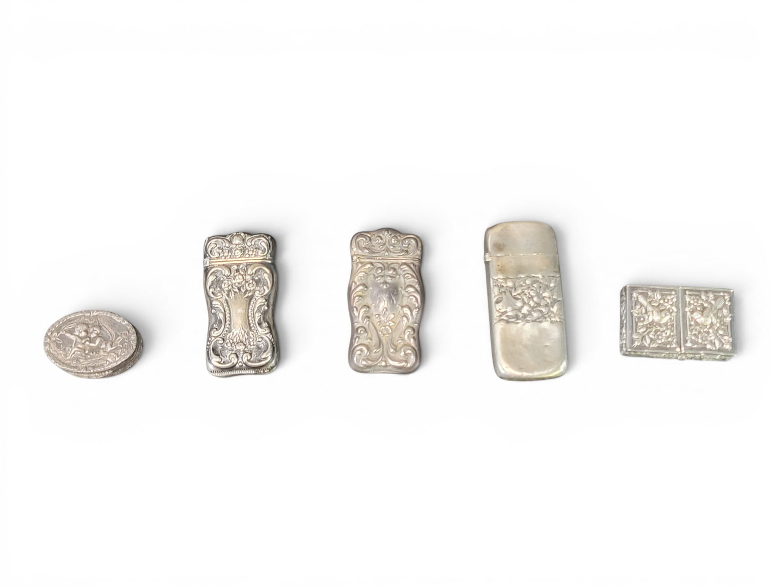 COLLECTION OF SILVER ACCESSORIES (1 of 5)
