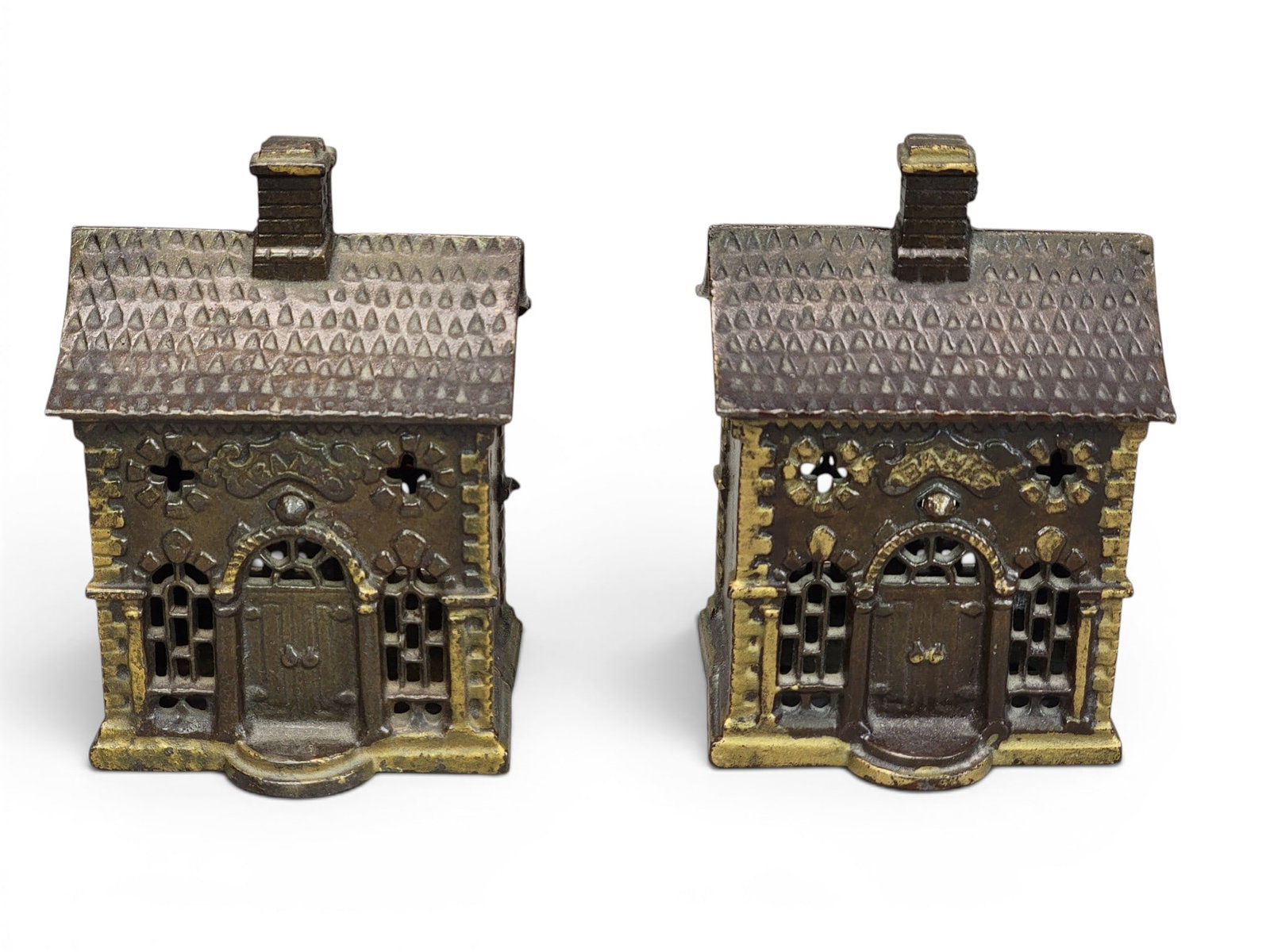 TWO CAST IRON HOUSE BANKS (1 of 4)