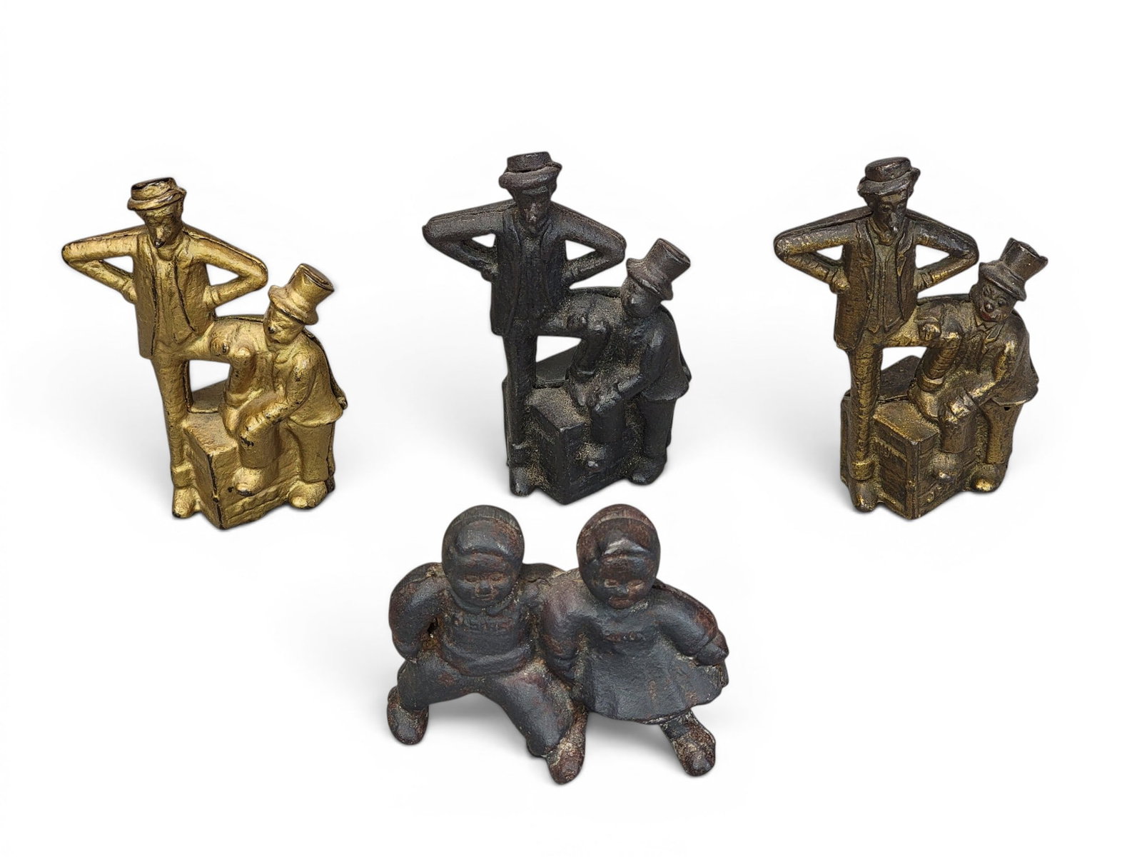 FOUR CAST IRON FIGURAL BANKS (1 of 6)