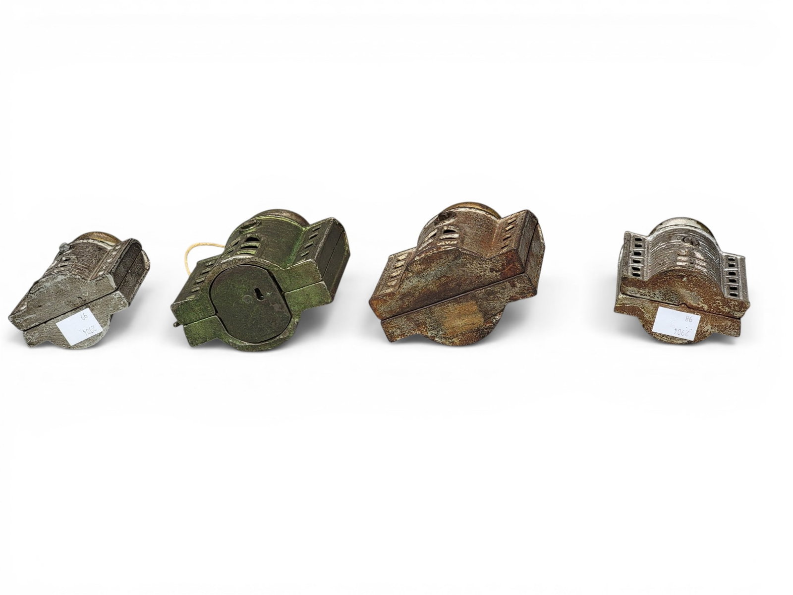 FOUR CAST IRON FIGURAL BANKS (1 of 8)