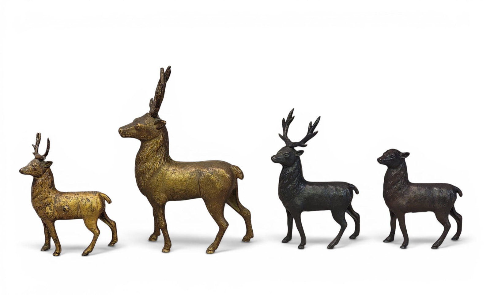 FOUR CAST IRON REINDEER BANKS (1 of 3)