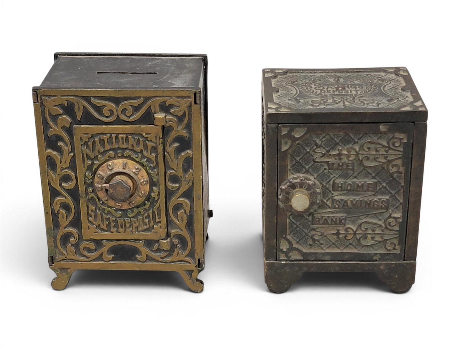 TWO CAST IRON SAFE BANKS: Includes National Safe Deposit (Moore catalog reprint, p. 54, n. 329); together with Home Savings Bank, 5.25" high. Provenance: a northeast Ohio collection. NOTE: We are happy to answer questions and