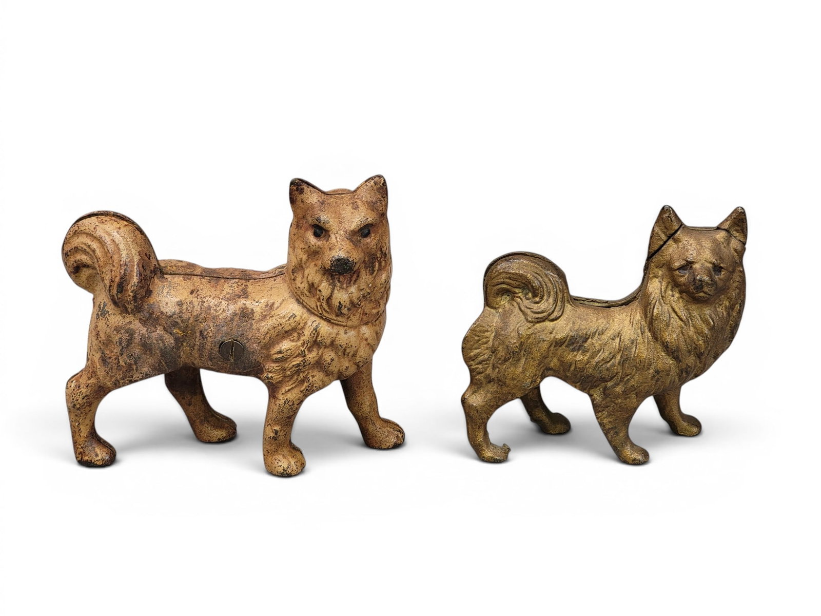 TWO CAST IRON DOG BANKS: Includes Grey Iron Casting Spitz (Moore 409); together with Labrador Retriever (Moore 411). Provenance: a northeast Ohio collection. NOTE: We are happy to answer questions and take additional photos