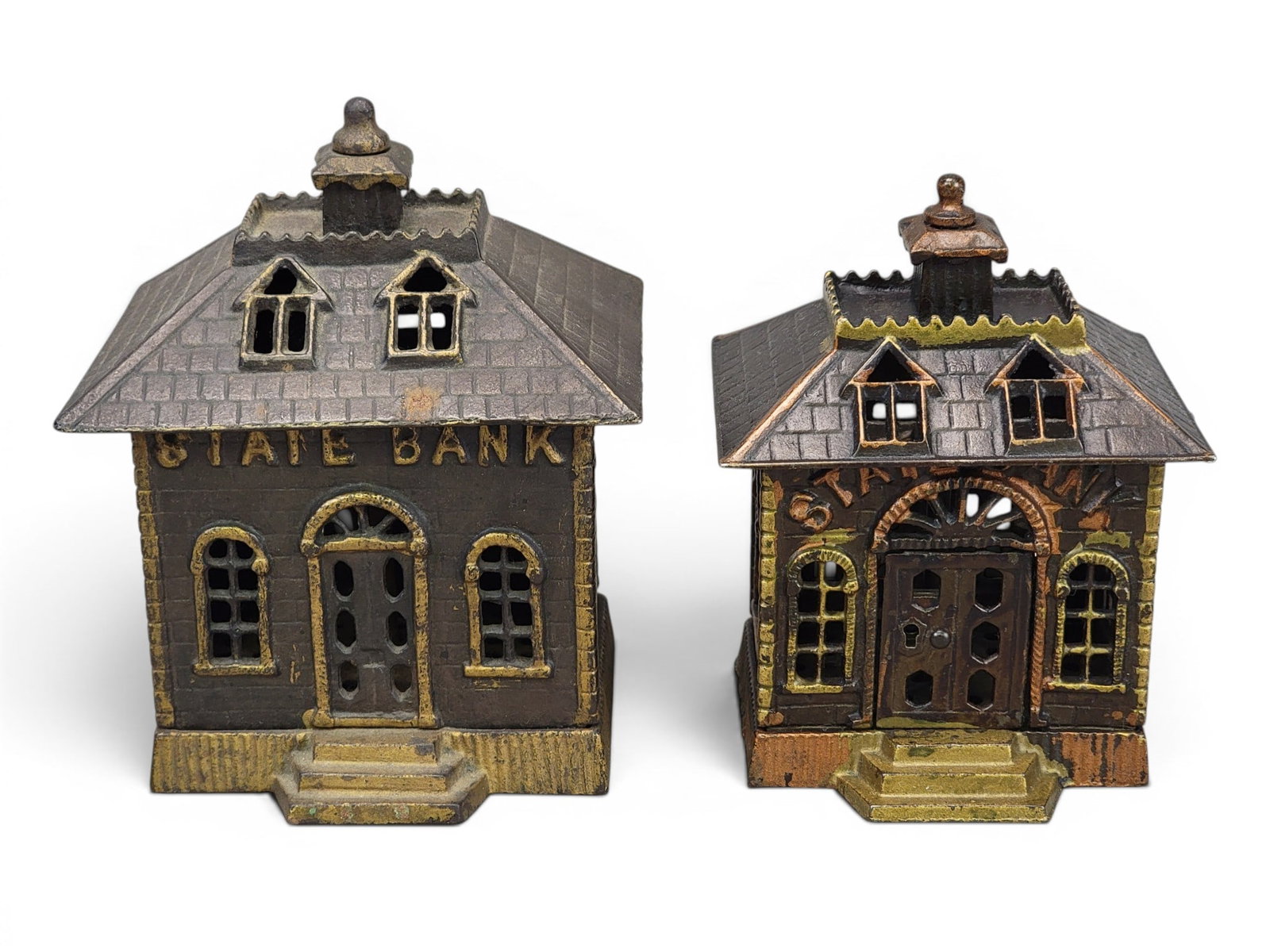 TWO CAST IRON STATE BANKS: Includes Kenton or Grey Iron Casting (Moore 1079); together with Kenton (Moore 1080). NOTE: We are happy to answer questions and take additional photos of lots prior to the auction (the sooner
