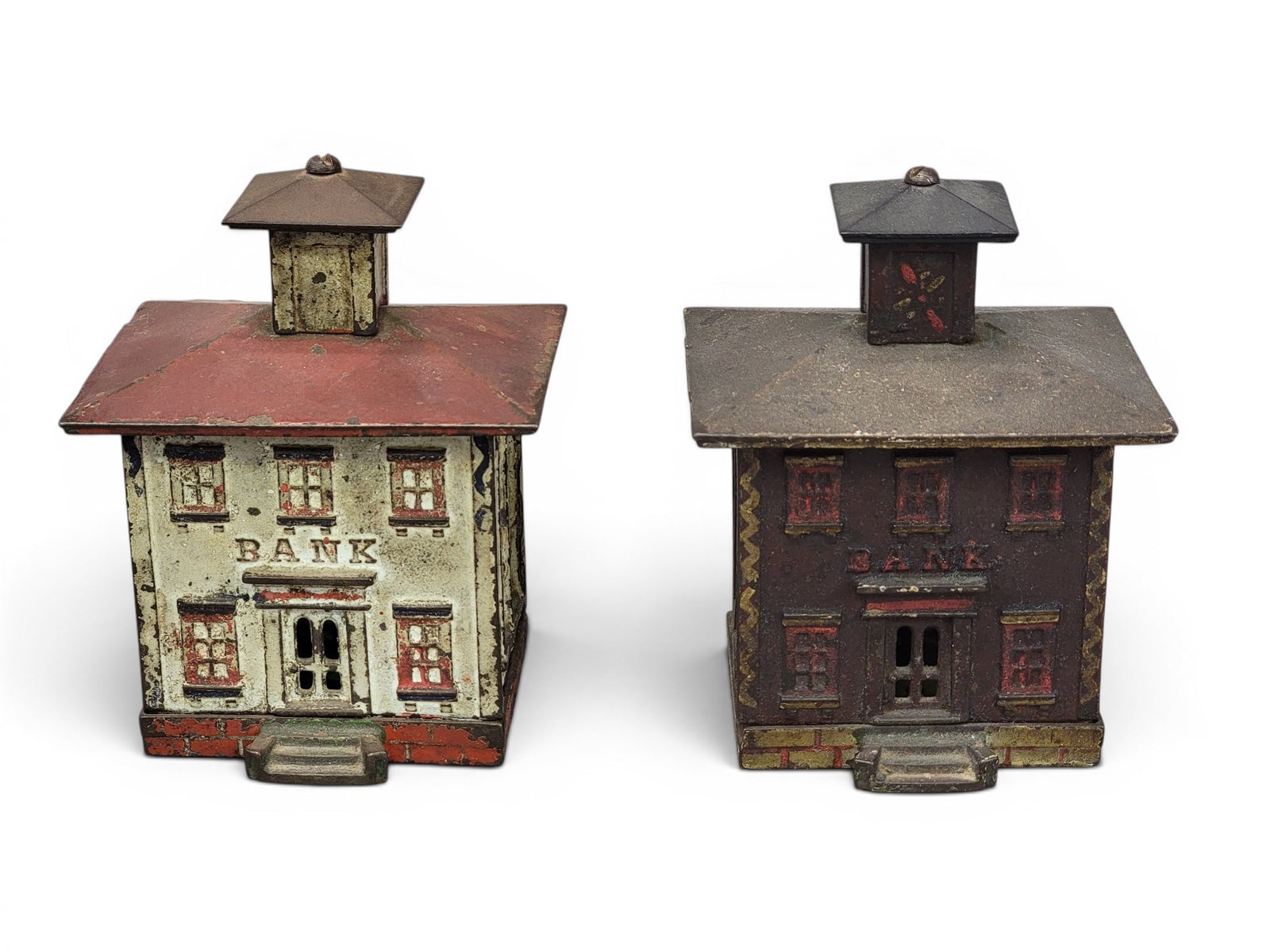 TWO CAST IRON BUILDING BANKS: Vermont Novelty or Stevens, Cupola Bank (Moore 1145). Provenance: a northeast Ohio collection. NOTE: We are happy to answer questions and take additional photos of lots prior to the auction (the