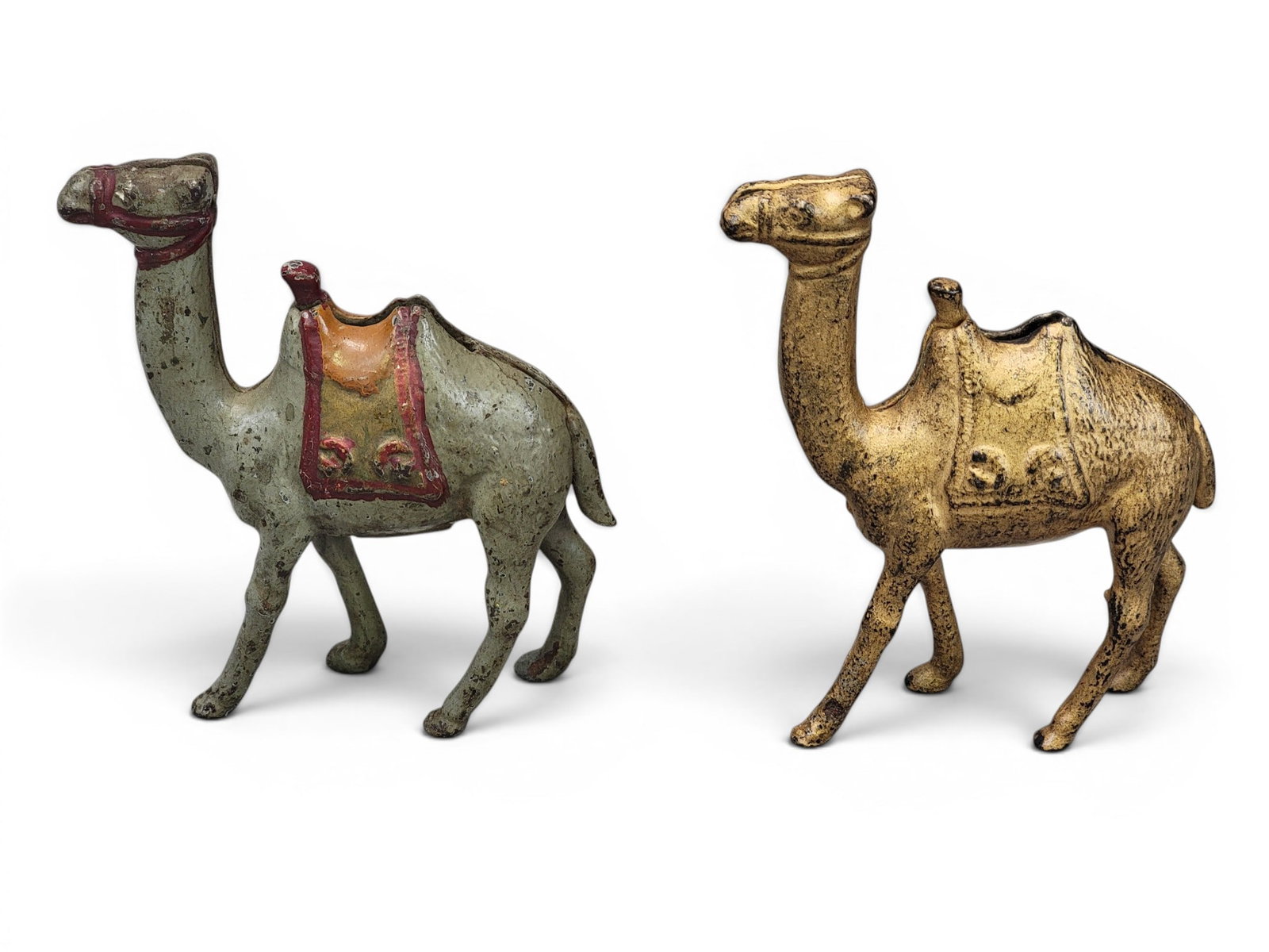 TWO CAST IRON CAMEL BANKS (1 of 2)