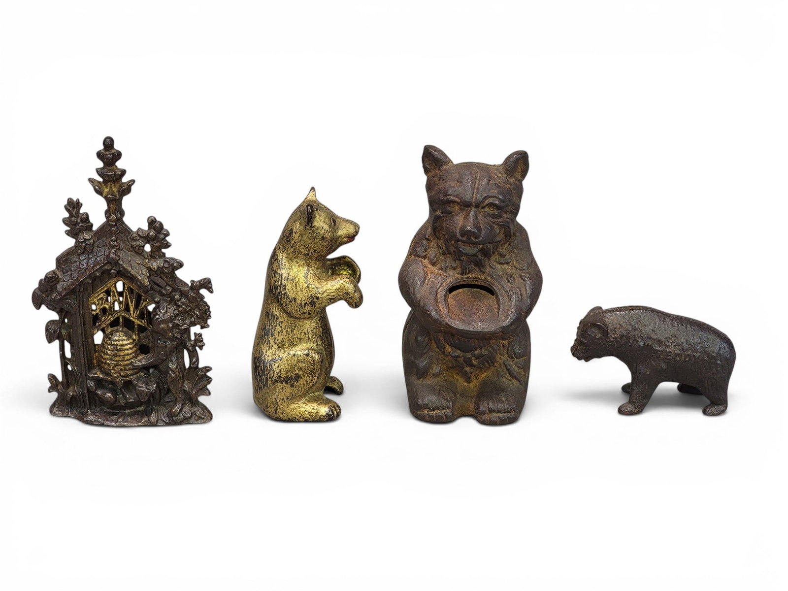 FOUR CAST IRON BEAR BANKS (1 of 13)
