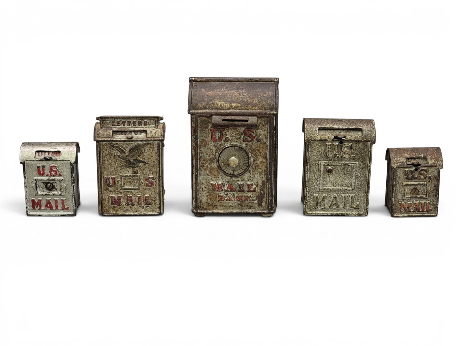 FIVE CAST IRON MAILBOX BANKS: Includes OB Fish, combo US Bank (Moore 834); Kenton US Mail large combo trap (Moore 835); AC Williams or Kenton US Mail Small (Moore 838); Arcade or AC Williams (Moore 839); and Kenton US Mail with Ea