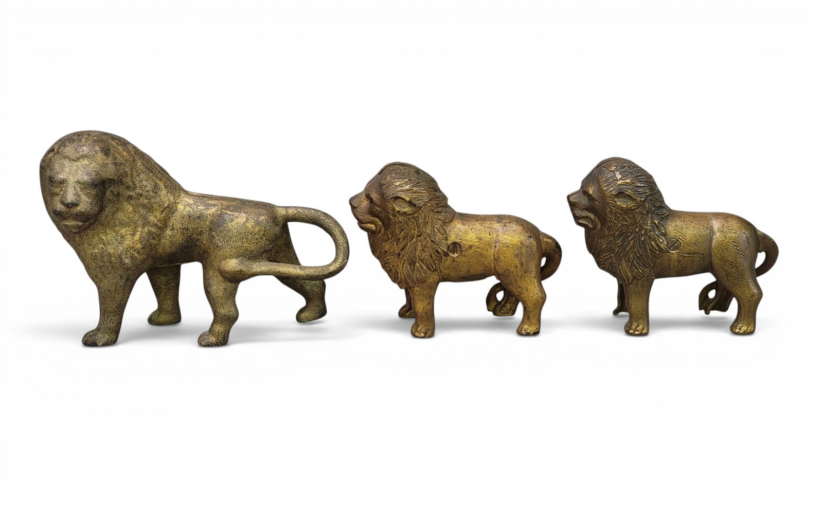 THREE CAST IRON LION BANKS (1 of 4)