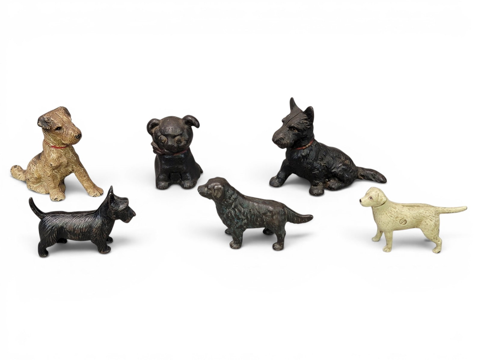 SIX CAST IRON DOG BANKS (1 of 16)