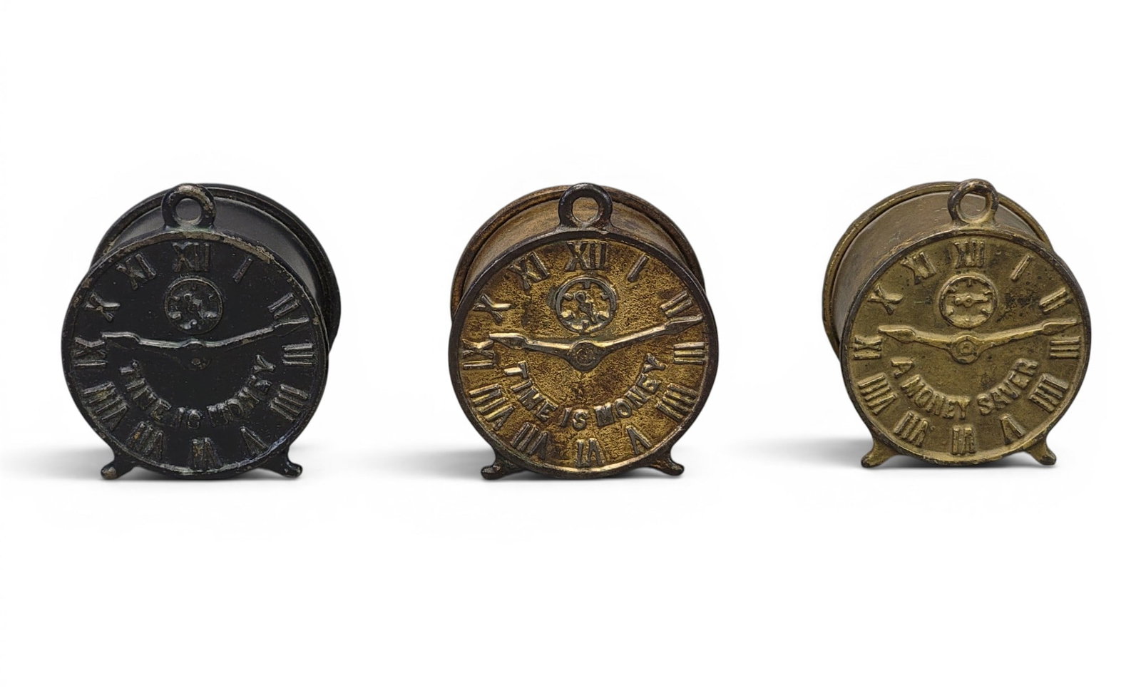 THREE CAST IRON CLOCK BANKS (1 of 7)