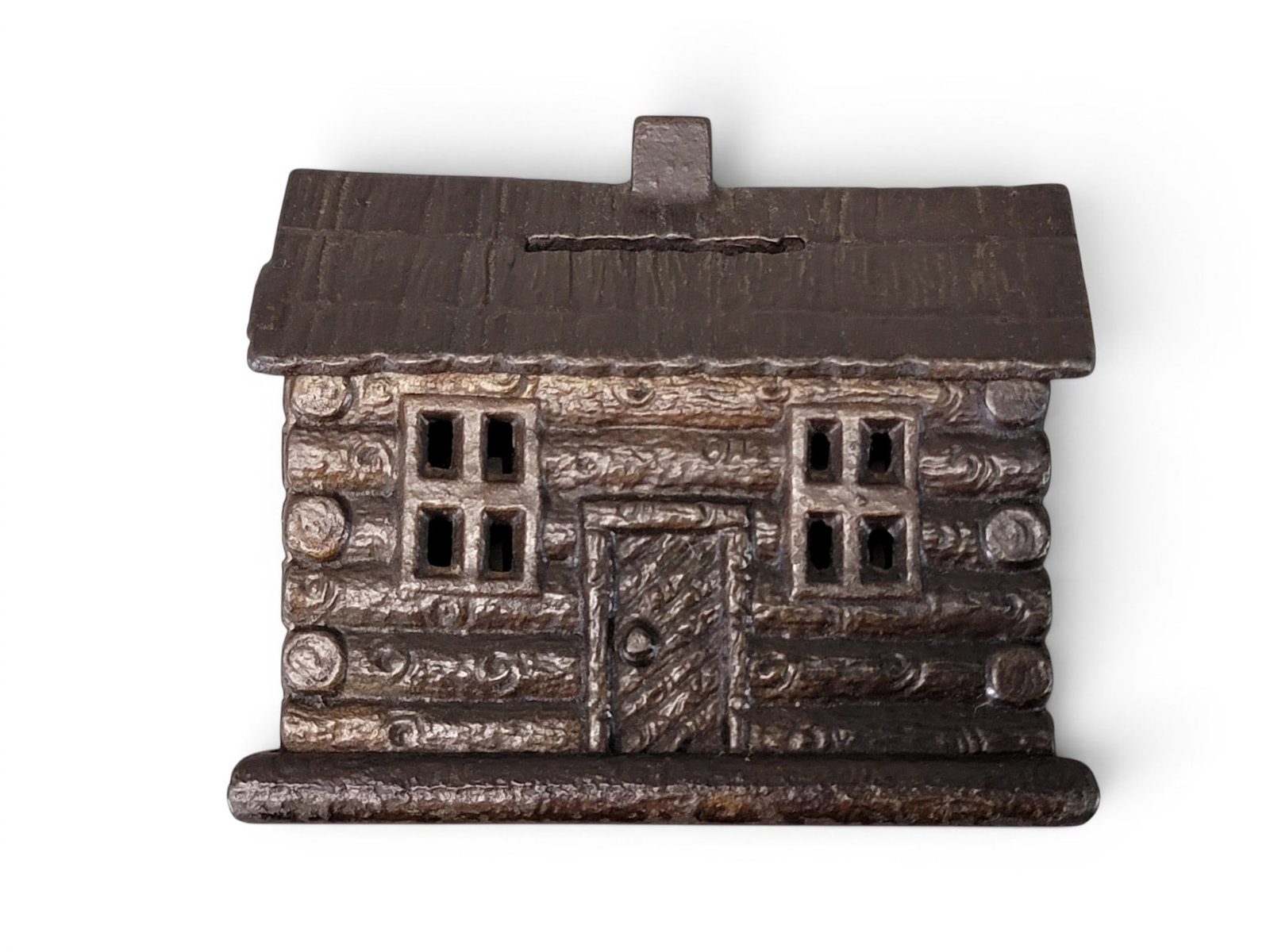 CAST IRON CABIN BANK: England, Cabin with Shake Roof (Moore 1024). Provenance: a northeast Ohio collection. NOTE: We are happy to answer questions and take additional photos of lots prior to the auction (the sooner submitt