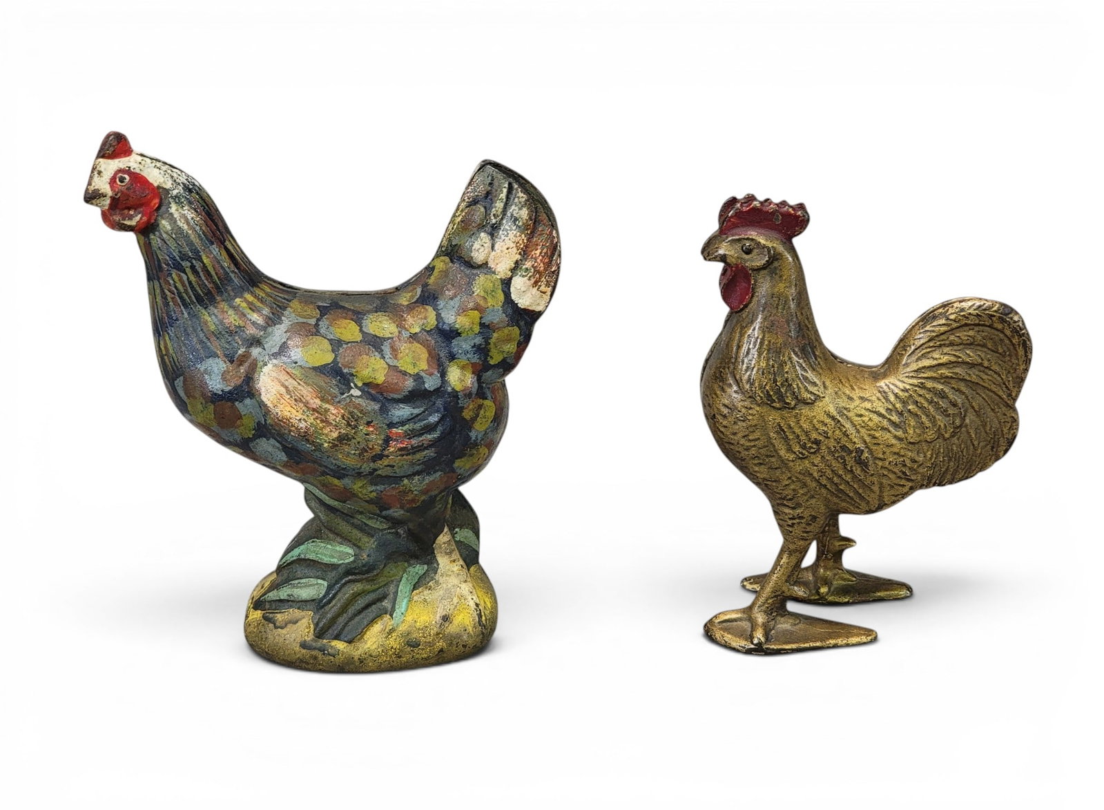 CAST IRON ROOSTER AND HEN BANKS: Includes an AC Williams or Hubley Rooster (Moore 548) and a Hen (Moore 549) with highly unusual polychrome paint. Provenance: a northeast Ohio collection. NOTE: We are happy to answer questions and ta