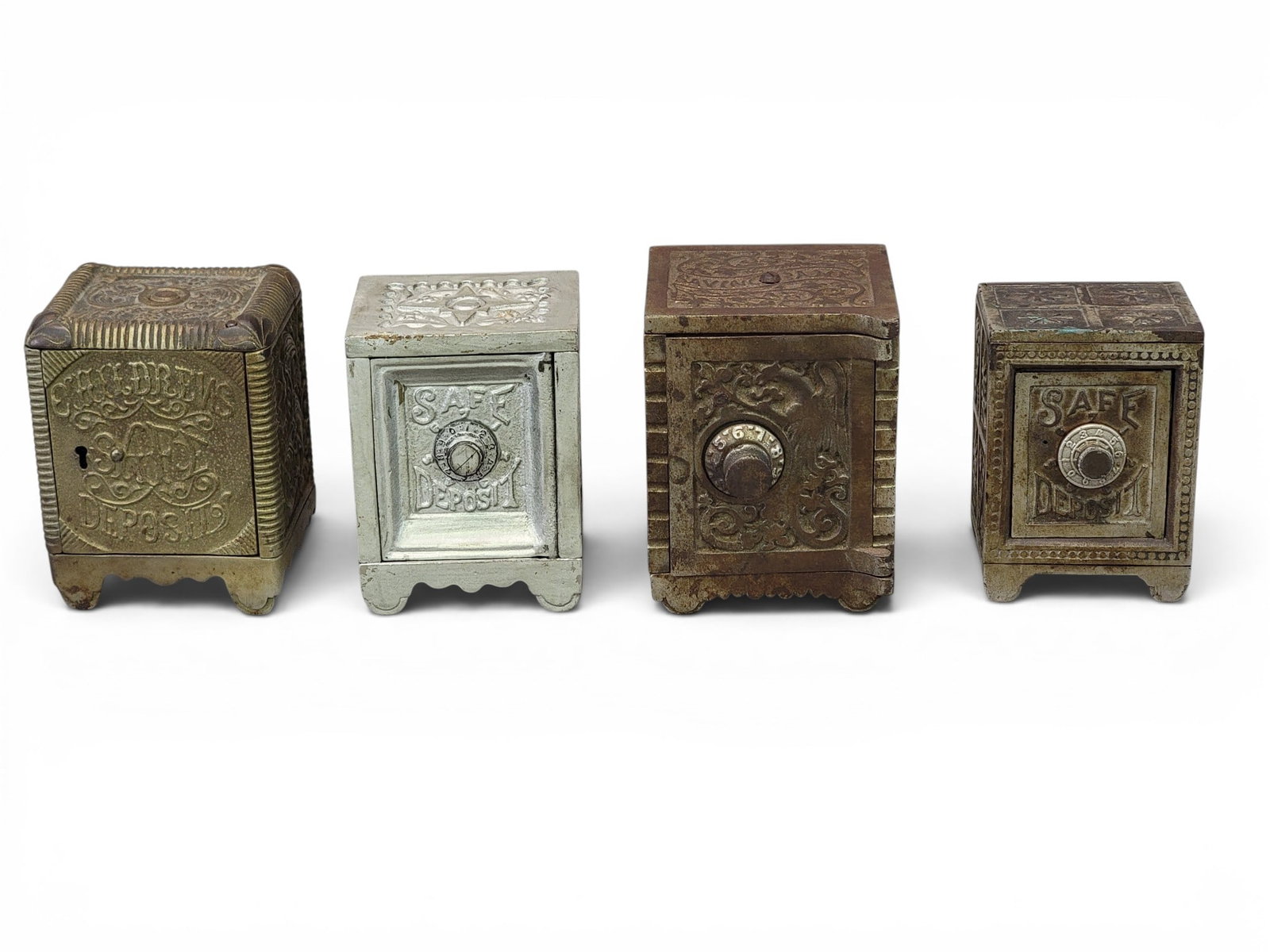 FOUR CAST IRON SAFE BANKS (1 of 20)