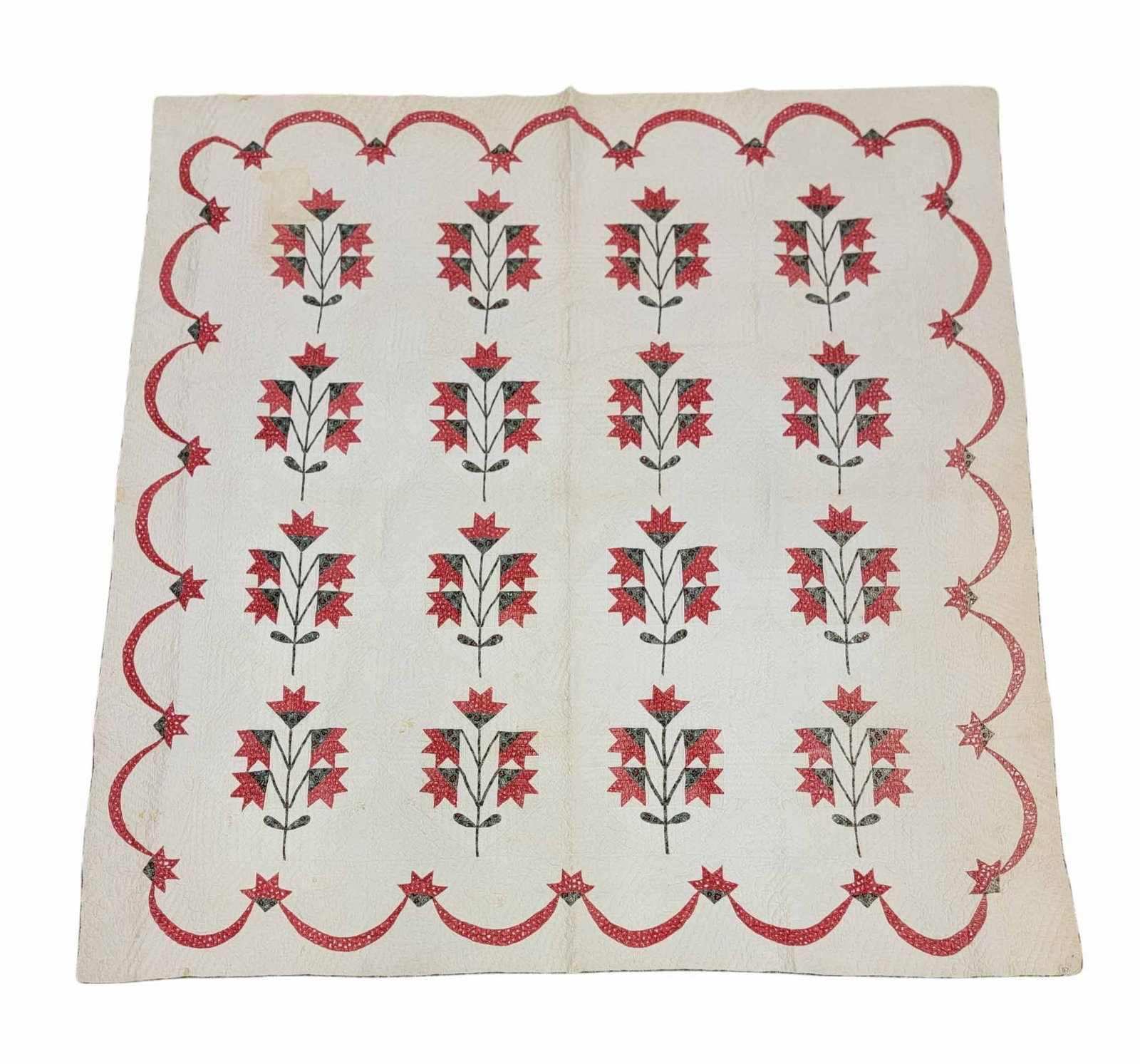 PENNSYLVANIA APPLIQUE QUILT: Attributed to Clarion, PA, mid-19th century, cotton. Five-tulip pattern with swag border, in red and green. 81" by 79". Provenance: the collection of the late Dr. Virginia Gunn, Wooster, Ohio. NOTE: