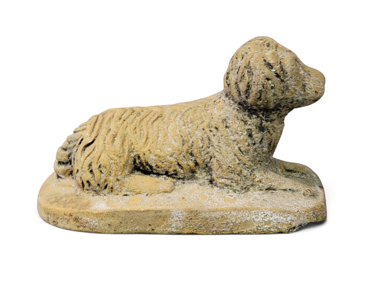 OHIO POTTERY DOG: Possibly Limaville, Stark County, early 20th century. Molded reclining dog on a rectuangular base, and with traces of an early painted surface. 8" long. Provenance: an Ohio collection. NOTE: We are