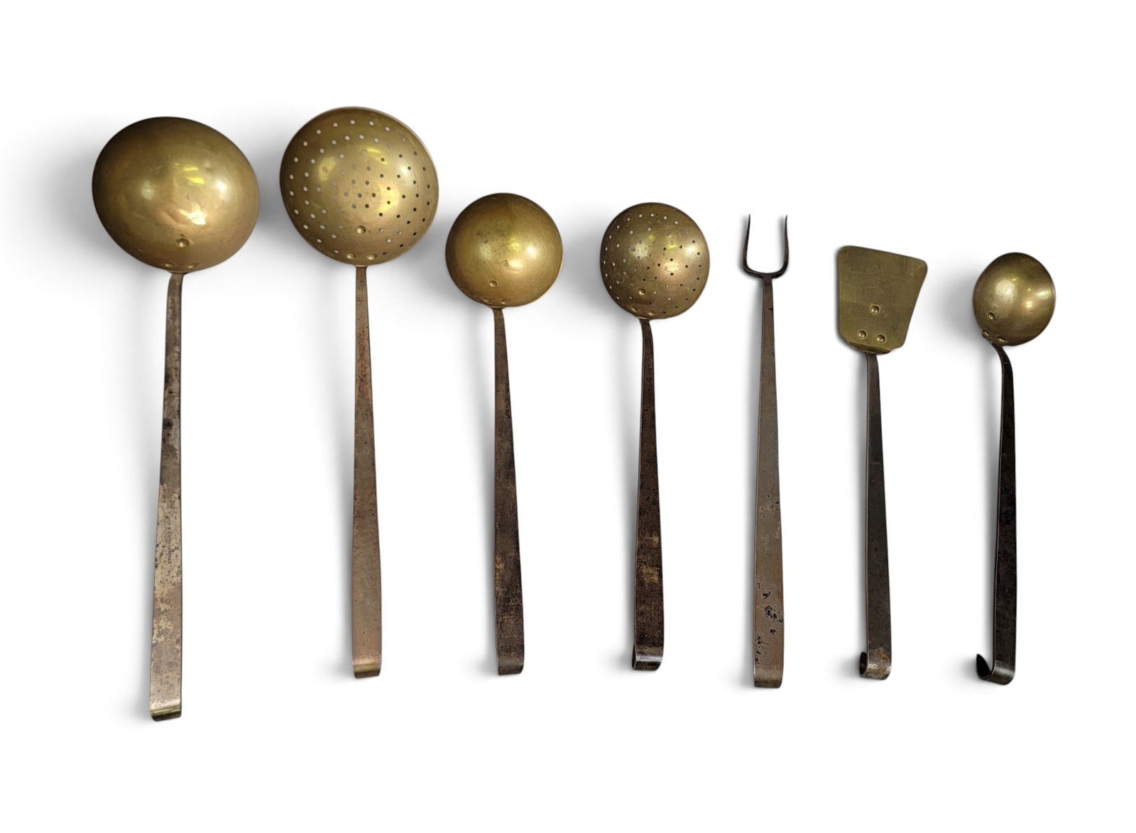 SET OF CANTON, OHIO COOKING UTENSILS: Marked for Fernando B. Smith (1854-c.1910), iron and brass, pat. date 1886. A complete set (large and small skimmers, large and small ladles, taster, and fork). Longest is 20" long. For more on