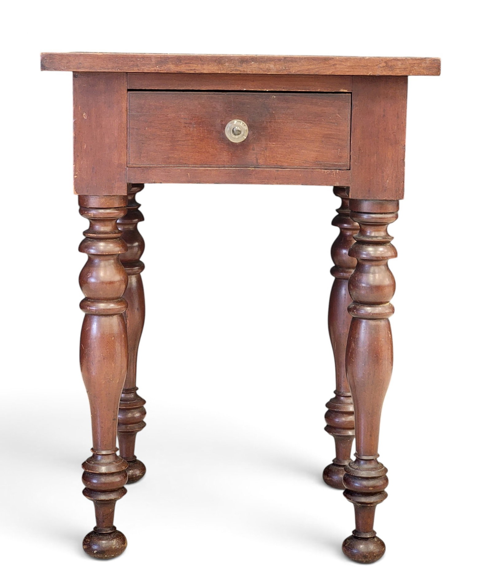 OHIO VALLEY ONE-DRAWER STAND: 1820-1840, cherry and poplar. One drawer and chunky, turned legs, and its original blown glass pull (probably Pittsburgh). 29.25" high, 18.75" wide, 21.25" deep. Provenance: from the collection of a g
