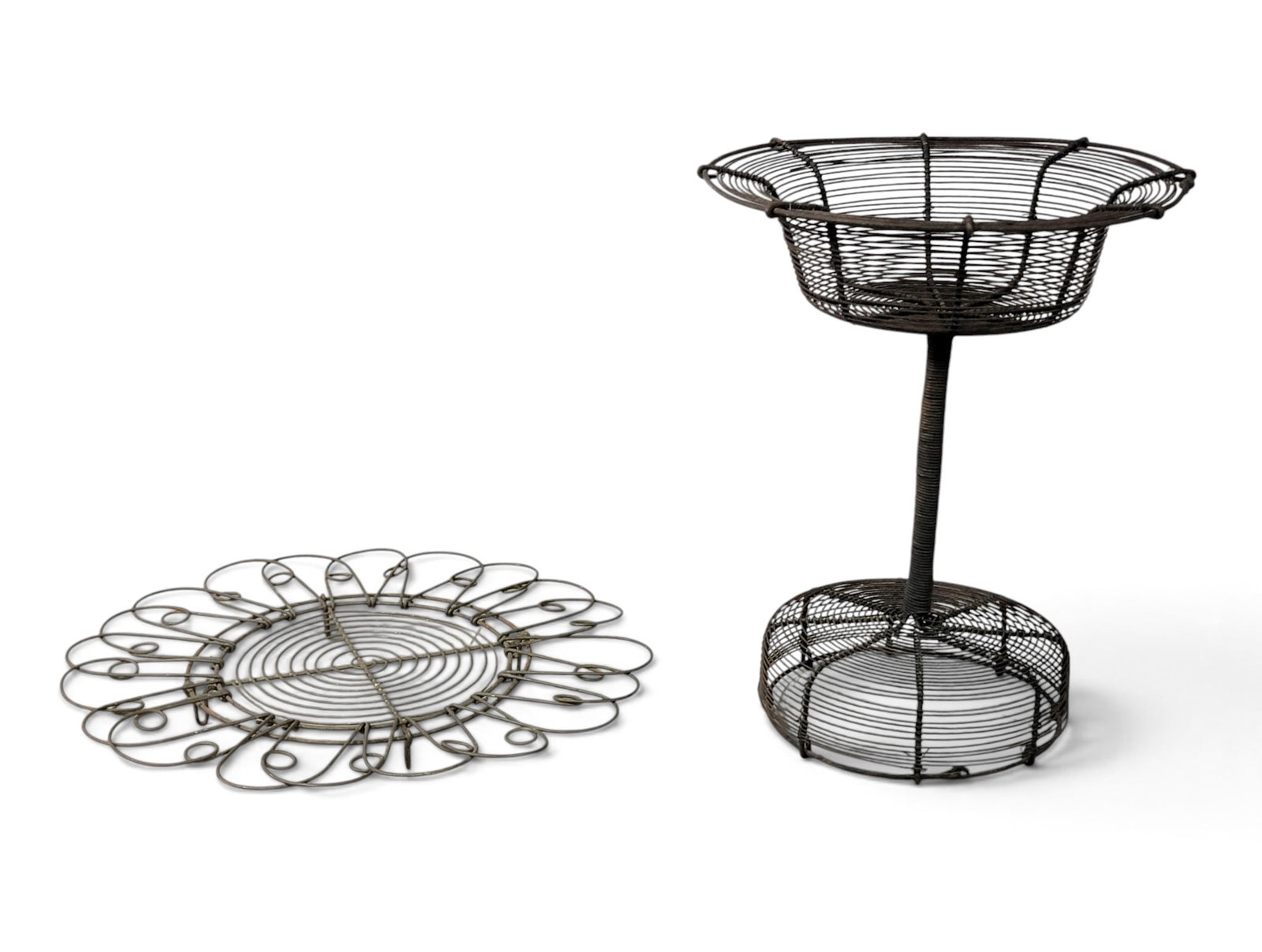 EARLY WIRE COMPOTE AND TRAY: American, early 20th century. Tall compote with domed base, 12" high; together with a footed tray or trivet, 12.5" diameter. Provenance: an Ohio collection. NOTE: We are happy to answer questions and