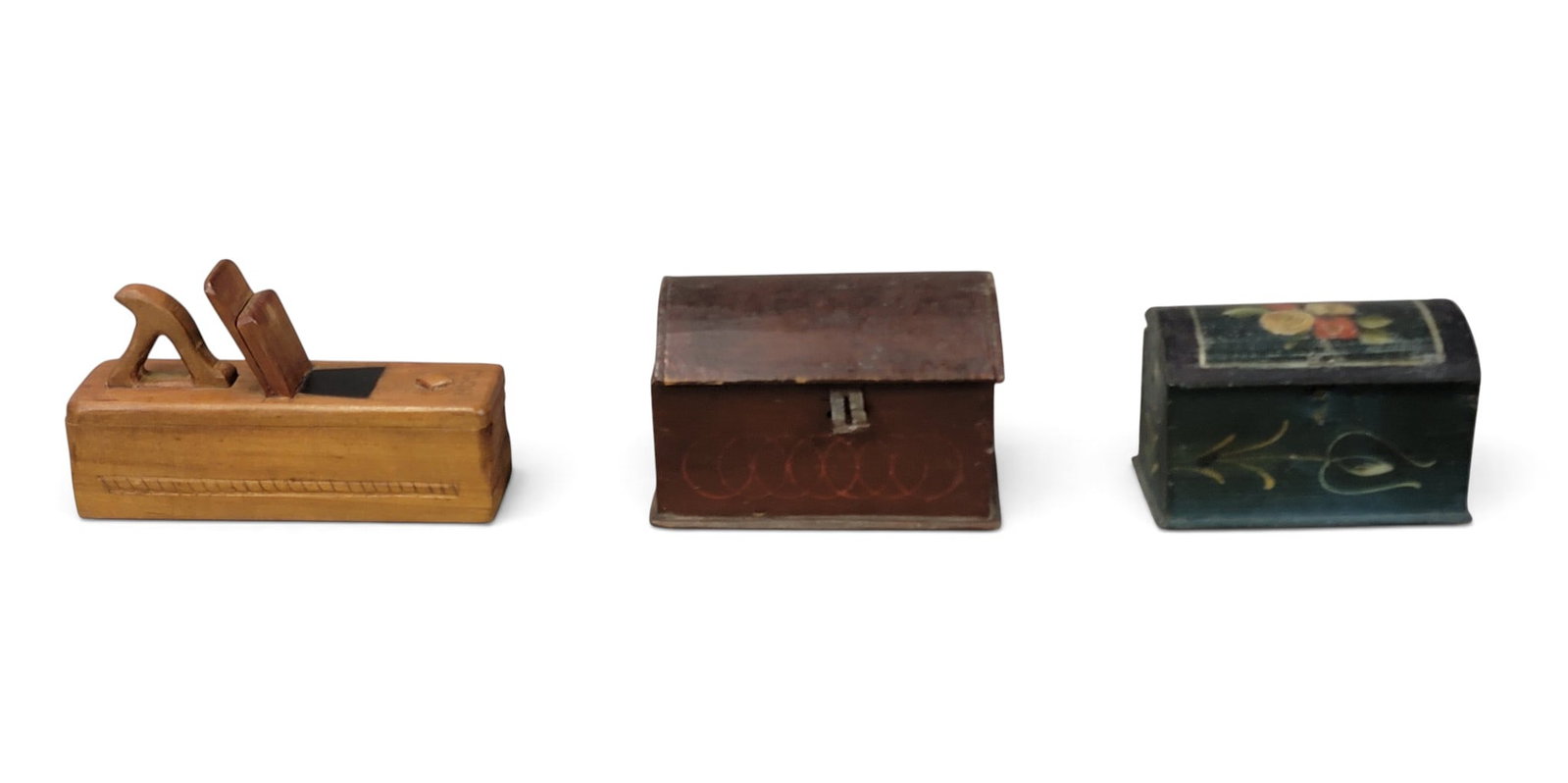 THREE MINIATURE BOXES: Includes two 19th-century dometop trinket boxes with original paint, 4.75" and 4.25" long; together with a folksy slide lid box made to look like a hand plane, with MCMLI on the lid and initialed "AQ"
