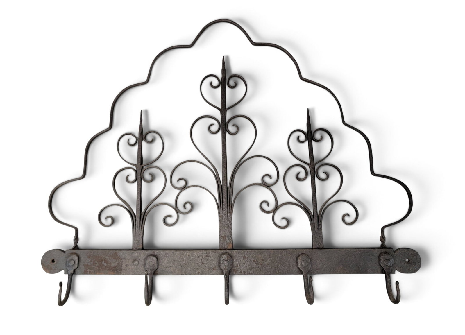 WROUGHT-IRON HANGING RACK: American, 19th century. With three split and scrolled vertical elements, and a wavy arch. 19.5" high, 24.5" wide. Provenance: a southeast Pennsylvania collection. NOTE: We are happy to answer