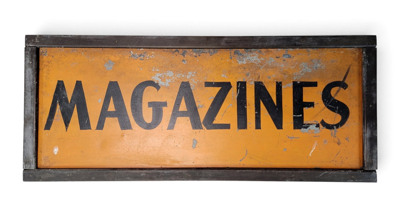 "MAGAZINES" SIGN: American, 2nd quarter-20th century, metal. Original orange and black paint, and black-painted wooden frame. 13" high, 31" wide. Provenance: a southeast Pennsylvania collection. NOTE: We are happy to