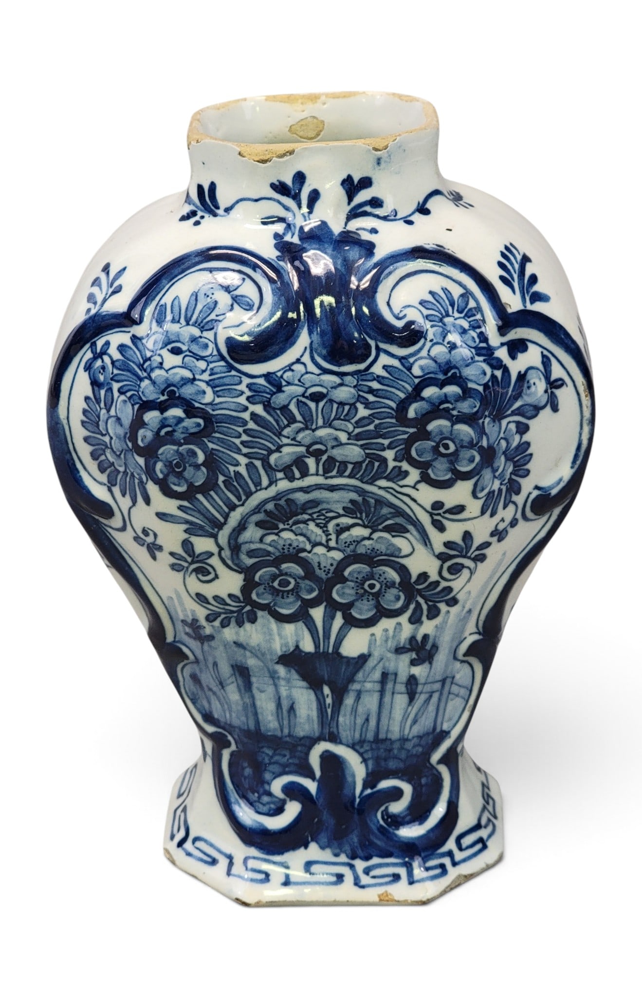 DELFT GARNITURE VASE: Dutch, 19th century, tin-glazed earthenware. With elaborate floral decoration. 8" high. Provenance: an Ohio collection. NOTE: We are happy to answer questions and take additional photos of lots prior