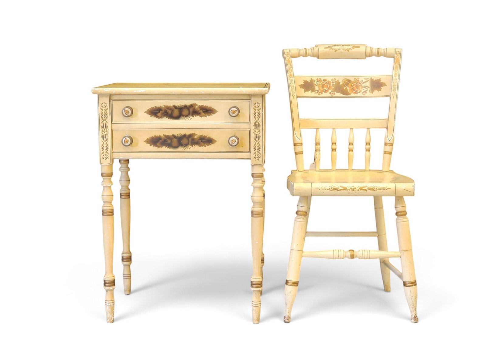 HITCHCOCK STAND AND CHAIR: Connecticut, 20th century, marked. Includes a two-drawer stand and a matching chair, with stenciled decoration on cream/yellow paint. 34.5" and 29.75" high. Provenance: an Ohio collection. NOTE: We