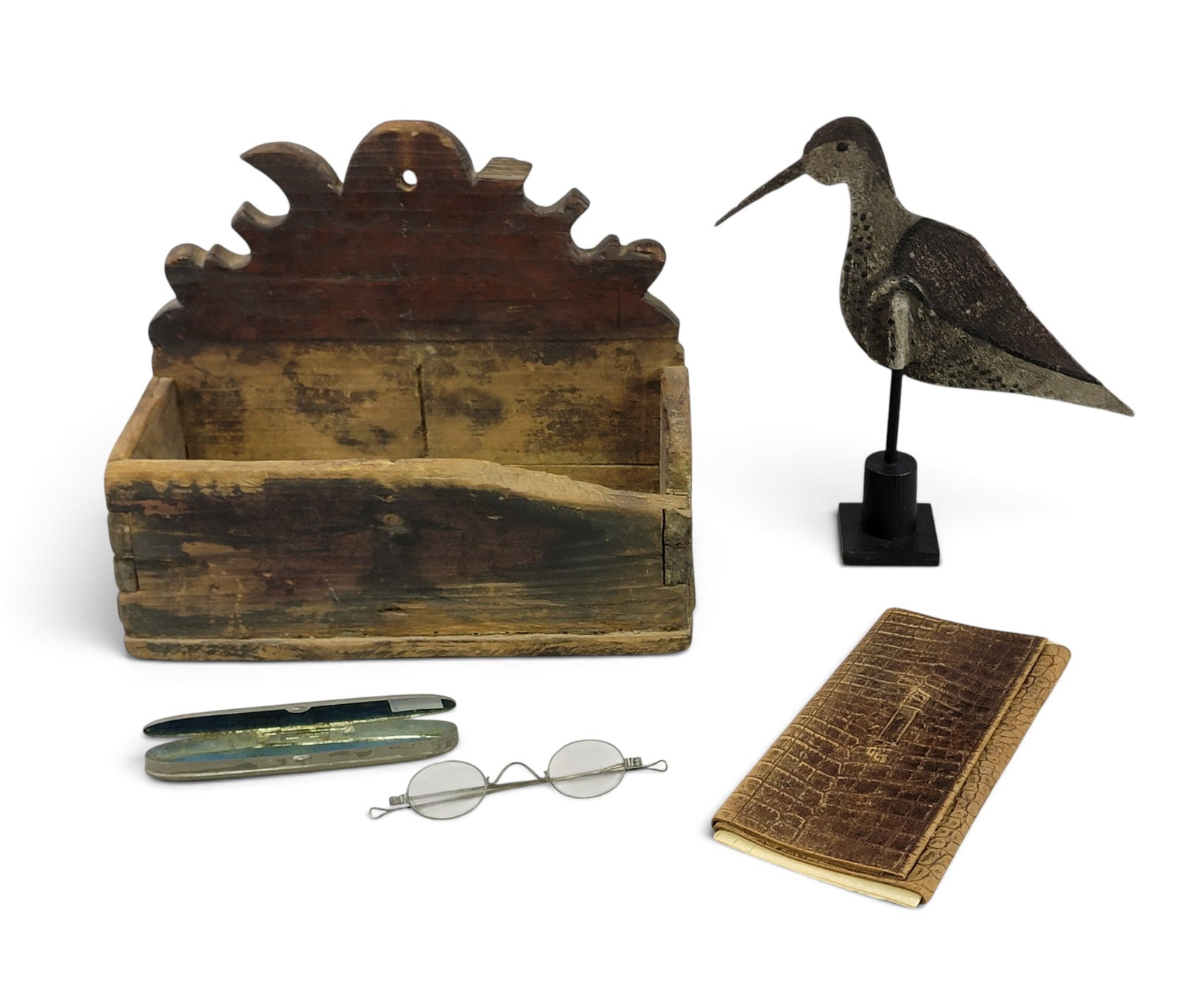 EARLY WALLBOX, SHORE BIRD, SPECTACLES, AND WALLET: Includes and 18th-century New England wall box with old surface, 11.25" wide; a pair of mid-19th century spectacles with case, 5.5" long; a folding leather wallet with manuscript poetry, 8" long; and 