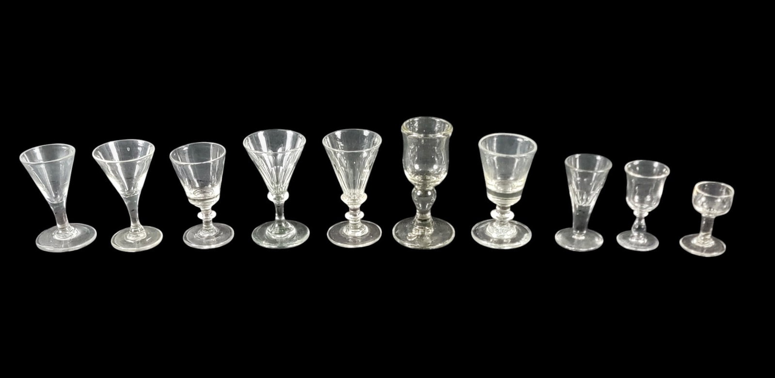 COLLECTION OF TEN EARLY GLASS CORDIALS (1 of 5)