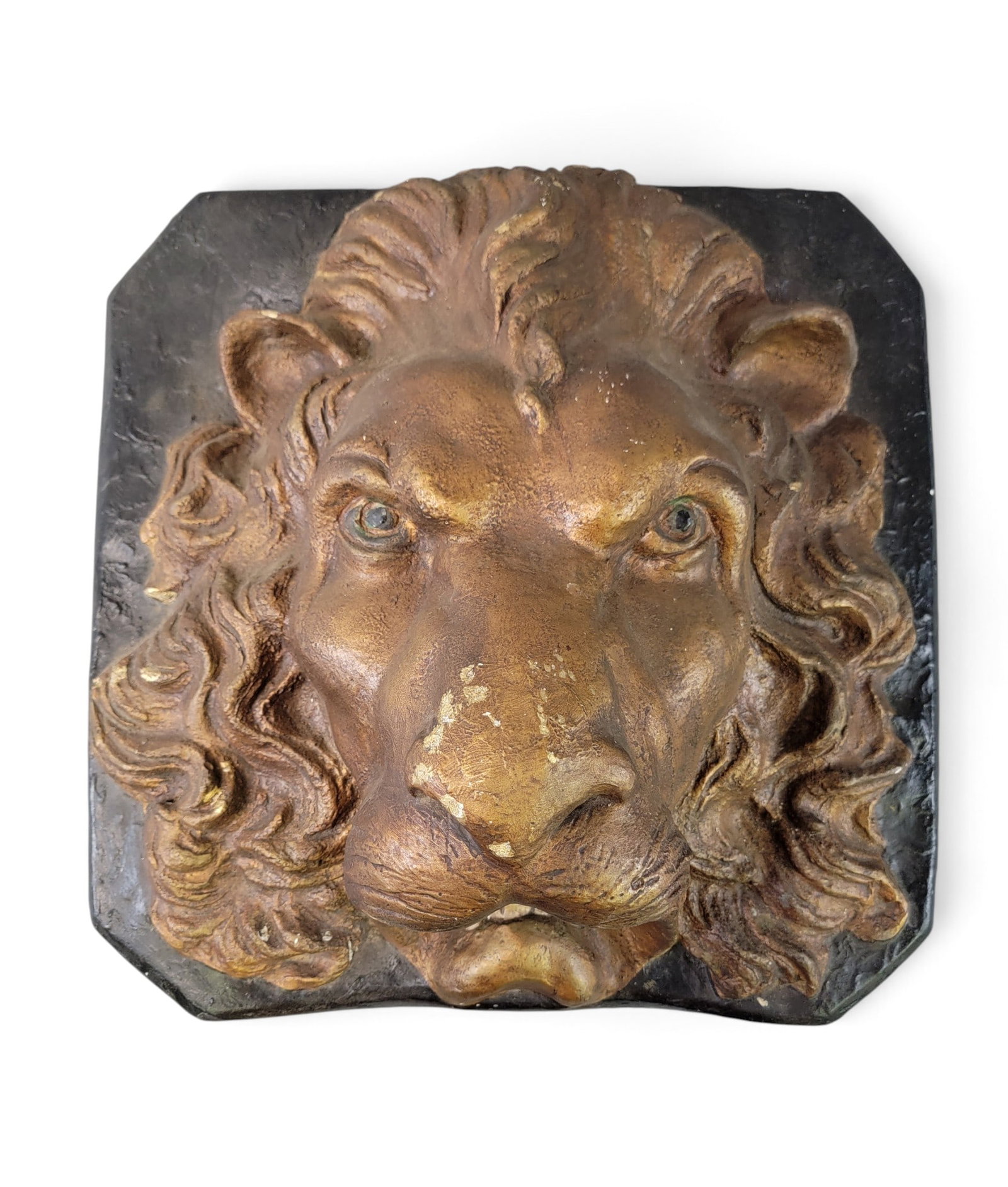 PLASTER LION ARCHITECTURAL MASK: Early 20th century. Molded and painted plaster lion's head. 17.5" square. Provenance: an Ohio collection. NOTE: We are happy to answer questions and take additional photos of lots prior to the