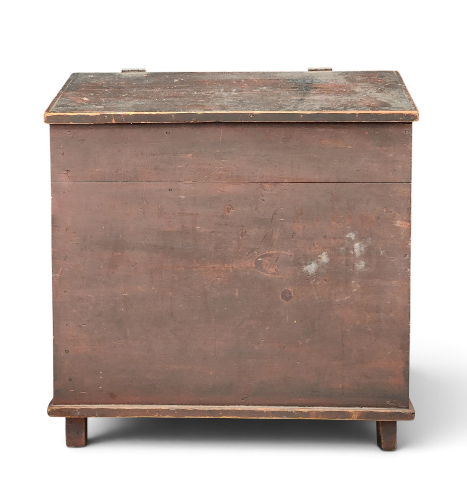 AMERICAN GRAIN BIN IN ORIGINAL PAINT: Late 19th century, pine. Slant-lid, divided interior, and tapered legs, and retaining its original red paint with dark, grungy surface. 34" high, 33" wide, 27" deep. Provenance: a New York State colle